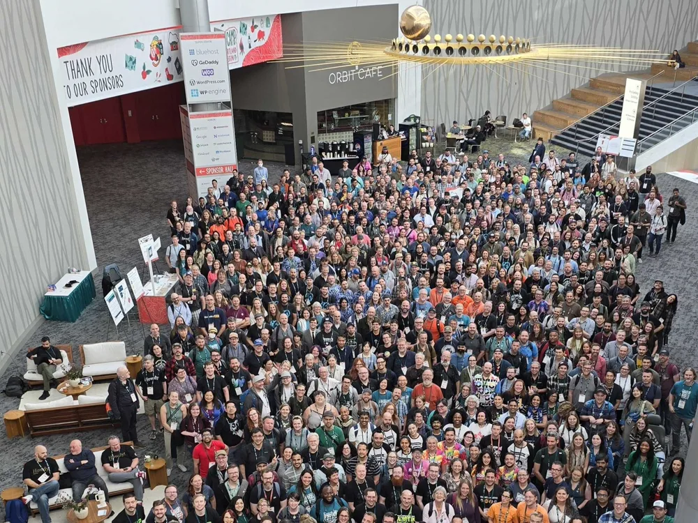 Hundreds of WordCamp US attendees gathered for the group photo