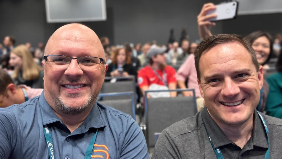 Eric and Steve Cuppett grabbing a selfie in a WordCamp US session